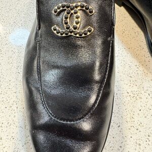 CHANEL Black Leather Loafers with Gold Accent